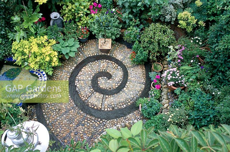 Patio - circular mosaic pattern. Aerial view of courtyard garden Chesham St in Brighton Sussex