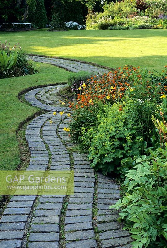 Path - winding brick path at Cobblers, Sussex.