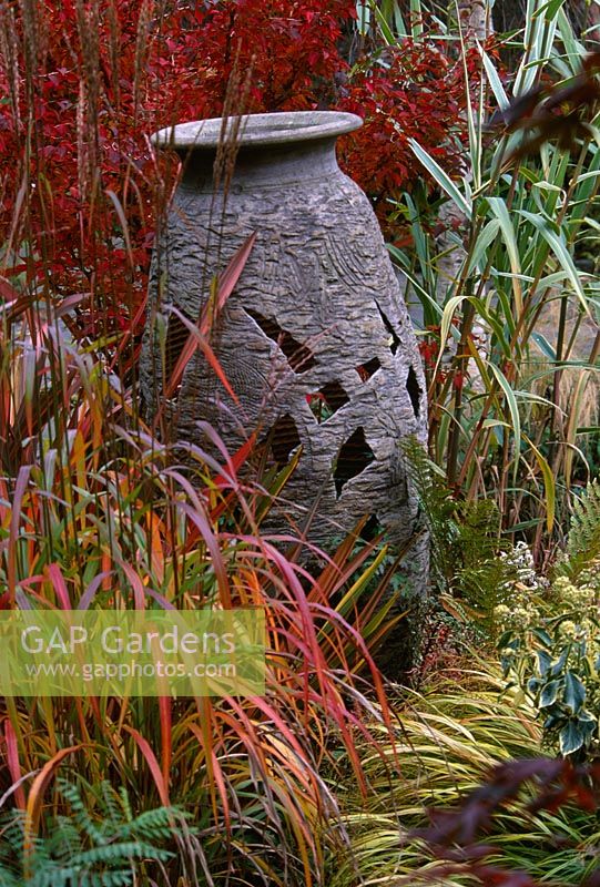 Urn resting in autumnal grasses, Designer Brian Cross, Lakemount, Ireland 