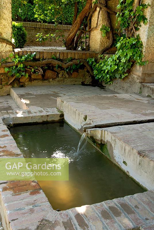 Rectangular brick pool with rill - Gardens of the Alhambra, Granada, Spain 