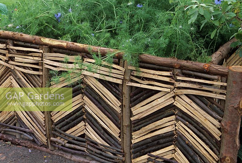 Rustic screen surround used for raised bed  Gardening Which garden, Hampton Court 2000