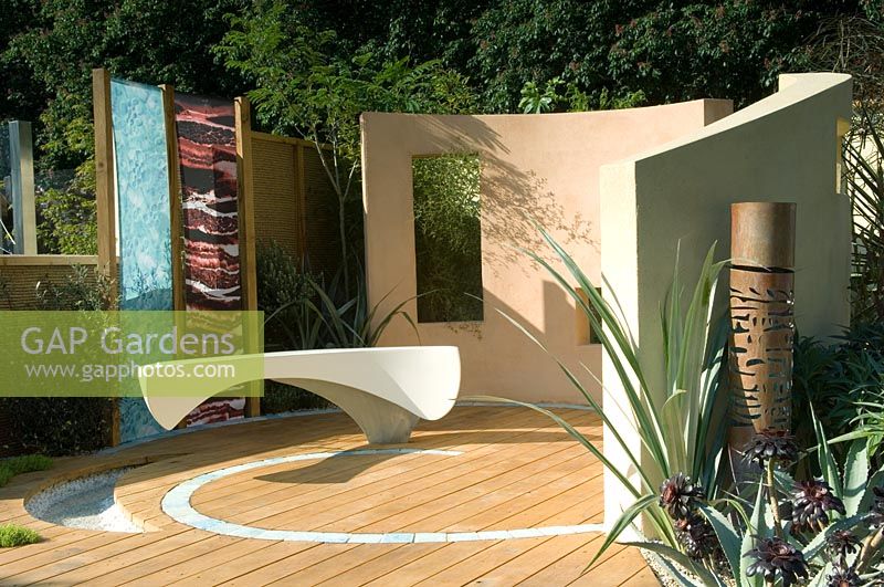 Ben Barrell's Crescent bench seat set in decked patio area - 'Porthgwyr Arts Garden', Chelsea 2007