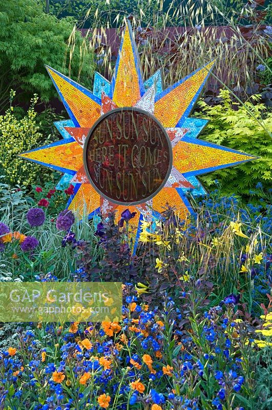 Sun ornament and mixed planting - From Life to Life, A Garden for George, RHS Chelsea Flower Show 2008