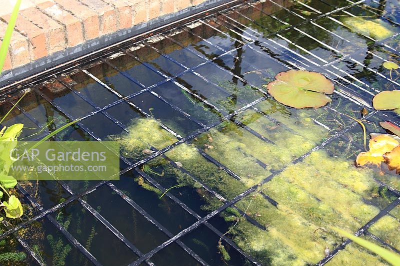 Pond safety - Metal mesh installed just below water surface prevents potential drowning
