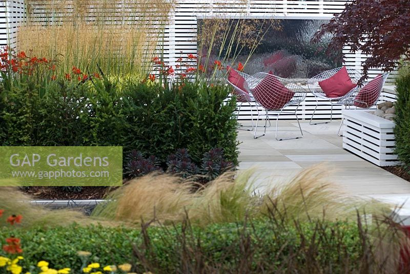 Seating area in the 'The Adlington Relax and Reflect Garden' for Adlington, Designed by Dan Milner - Tatton Flower Show 2008