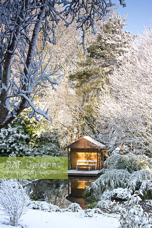 April snow and the wildlife pond and gazebo at Honeybrook House Cottage, Worcestershire