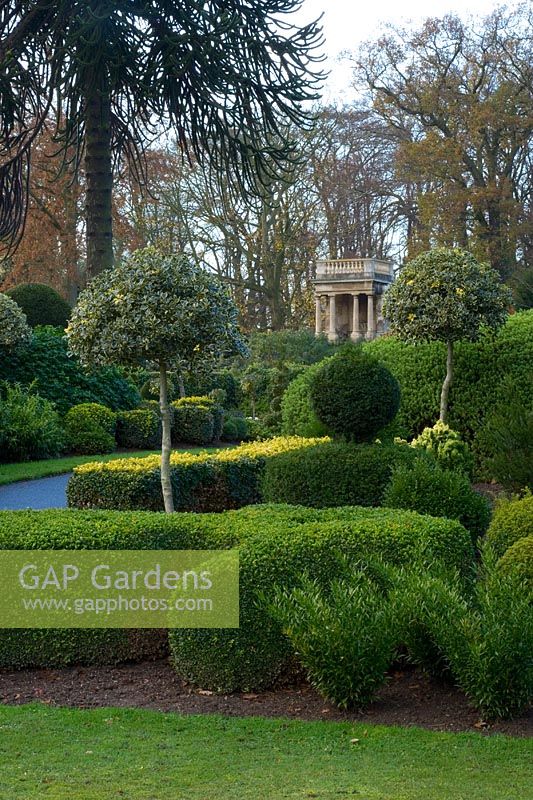 Evergreen topiary borders and temple