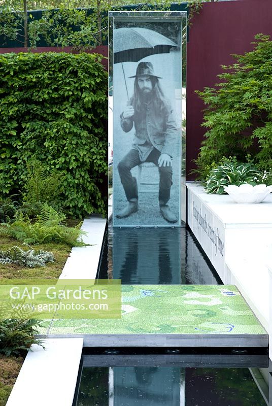 Photograph of George Harrison beside water feature - From Life to Life, A Garden for George, RHS Chelsea Flower Show 2008 