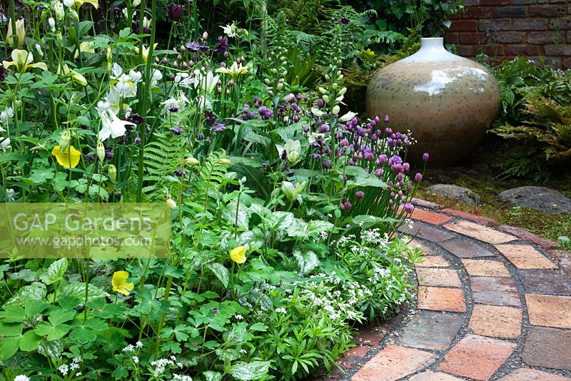 Pottering in North Cumbria, sponsored by University of Cumbria, Cumbrian Homes Ltd, Copeland Borough Council - Silver Flora medal winner for Courtyard Garden at RHS Chelsea Flower Show 2009 
