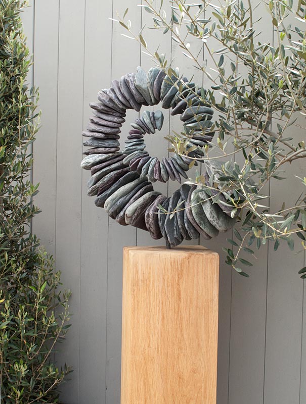 Spiral stone garden sculpture by Tom Stogdon at the RHS Chelsea Flower Show