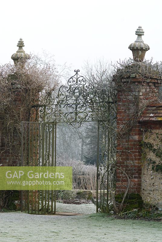 Ornate metal gates in frost, Heale House Gardens, Wiltshire