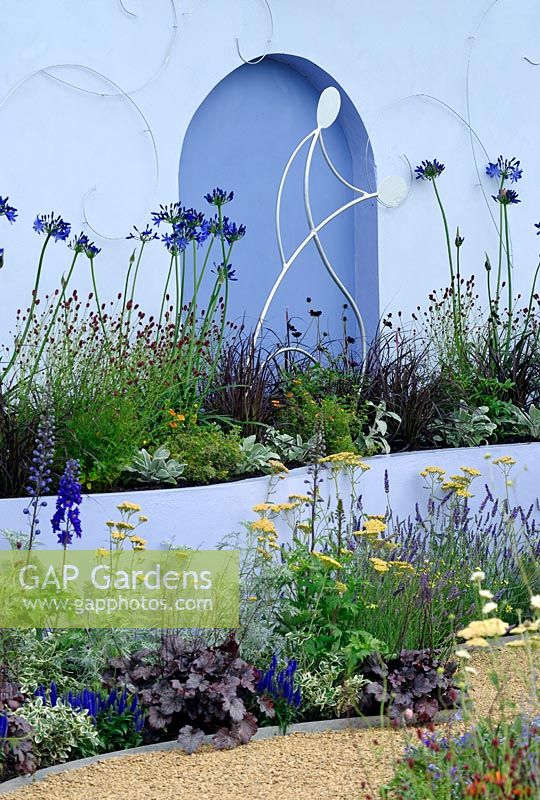 Brightly painted raised beds and blue themed borders.
RHS Tatton Park Flower Show 2009