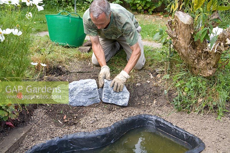 Garden pond project - step by step - adding edging stones 