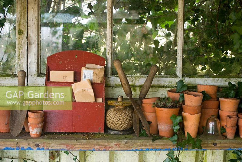 Clay pots and seeds in potting shed