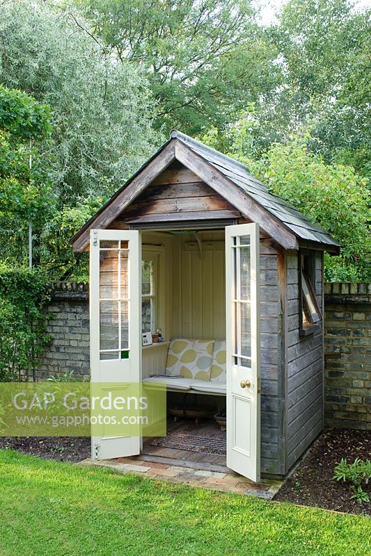 GAP Gardens - Small timber summer house with bench seat ...