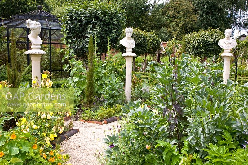 Potager with vegetables and busts on columns