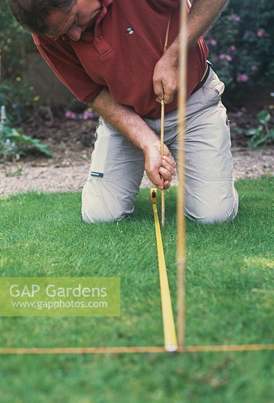 Measuring and marking out plots - Set out canes or pegs as markers at regular intervals to give an easy visual reference when looking around your garden
