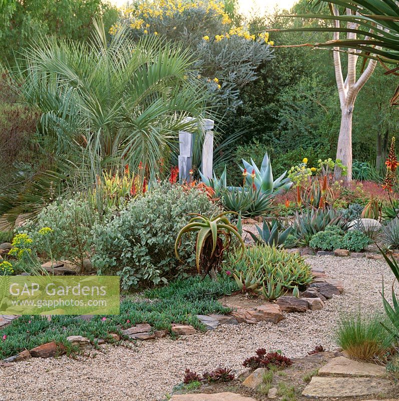 Drought tolerant garden with gravel path in Southern California