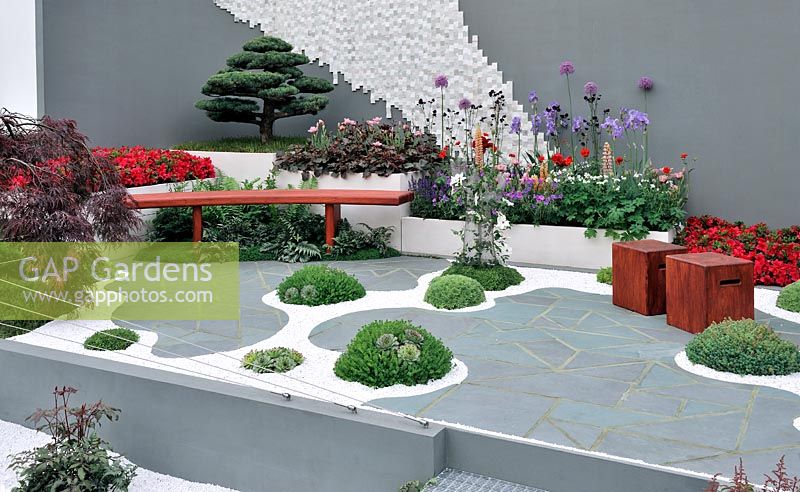 Contemporary dry water garden, inspired by Japanese Zen gardens that represent beautiful scenery in conceptual ways - The Waterless Garden, Silver medal winner at RHS Chelsea Flower Show 2010