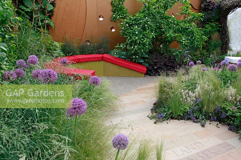 Patio area in The John Joseph Mechi Garden, sponsored by Wilkin and Sons - Bronze medal winner at RHS Chelsea Flower Show 2010