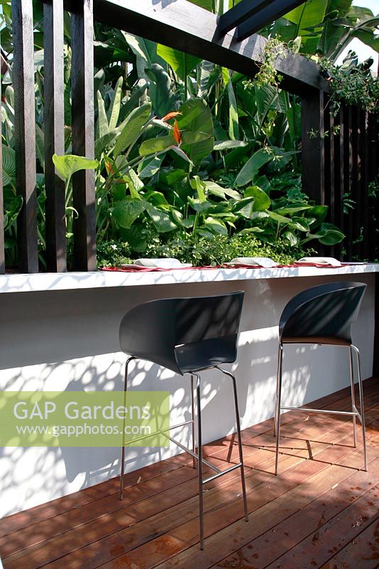 Built in bar and entertaining area in tropical garden. Trailfinders Australian Garden, Gold medal winner, RHS Chelsea Flower Show 2010 