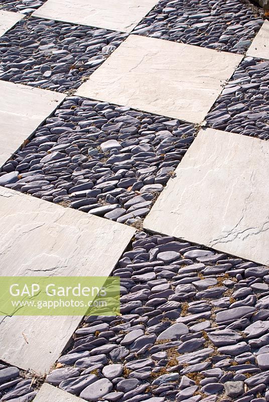 Path pattern made from paving stone and embedded pebbles at Summerdale House, Cumbria NGS