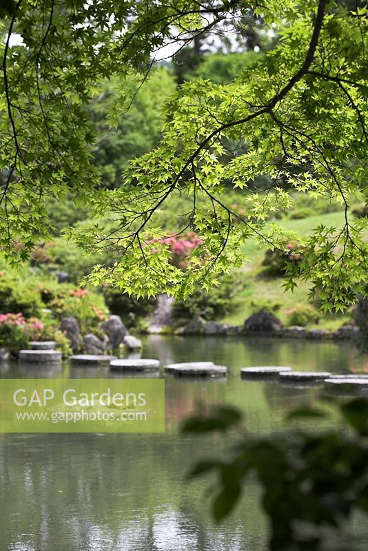 Eastern garden with millstone stepping stones - Isuien Gardens, Nara, Japan