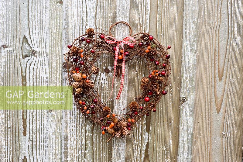 Autumn rustic decoration with red and orange berries
