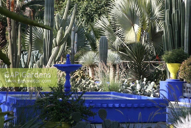 Blue fountain in Jardin Majorelle in Marrakech, Morocco