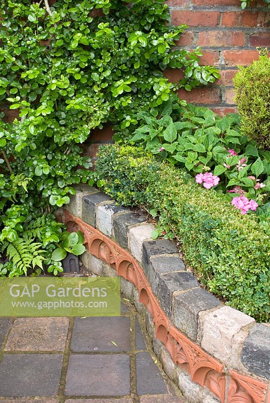 Path and walls made of reclaimed paviours, red tiles, cobbles and red bricks with Buxus - Box hedge - Brocklebank Road, Southport, Lancashire NGS 
