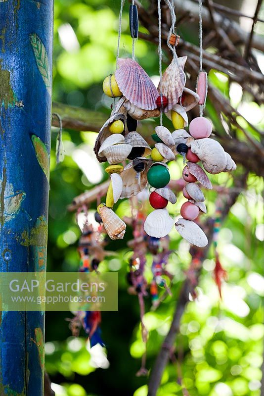 Decorative, colourful mobiles handmade by students using recycled materials like shells and beads - Palatine Primary School, Worthing