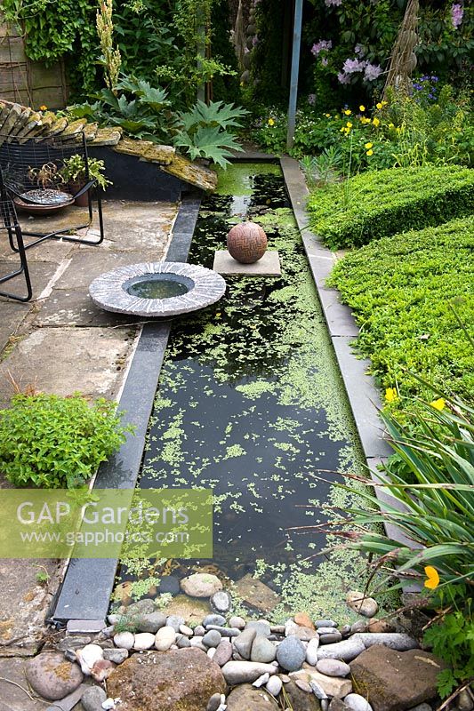 Rectangular pond with stoneware pot by Gordon Cooke 17 poplar grove