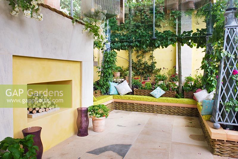 Outdoor living room with fireplace - 'The M and G Investments Garden', Silver Gilt Medal Winner, RHS Chelsea Flower Show 2011 