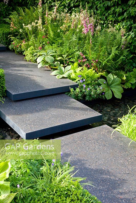 Polished concrete stepping stones. 'The Lands' End Across the Pond Garden'. Gold Medal Winner. RHS Chelsea Flower Show 2011
