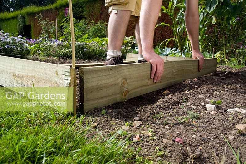 step by step, making a raised bed - squaring up planks