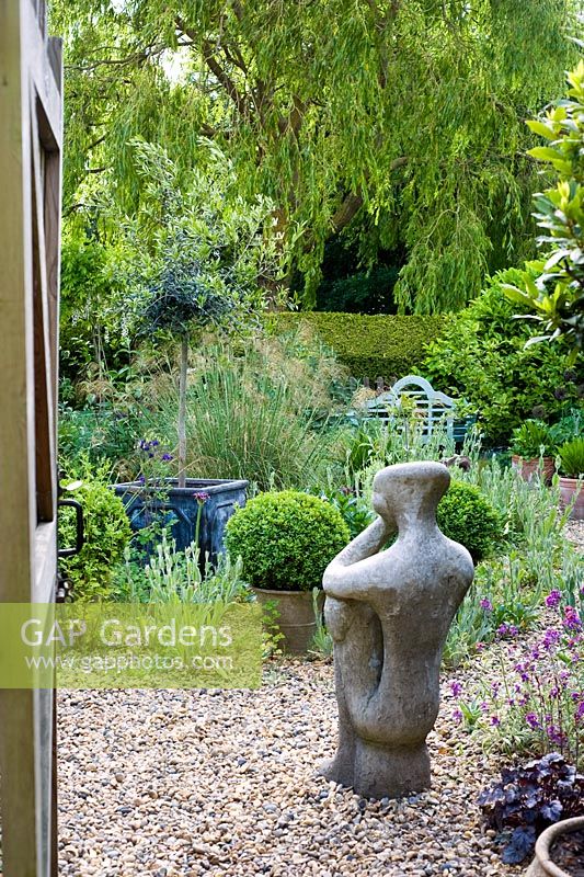 Sculpture in dry garden - Wickets, Essex NGS