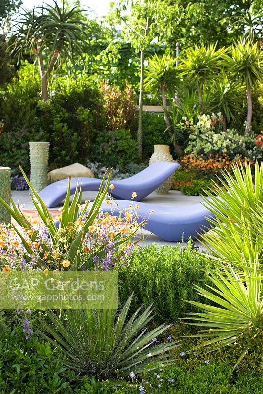 Mediterranean style garden with Aloe, rosemary and citrus tree - 'A Monaco garden', RHS Chelsea Flower Show 2011