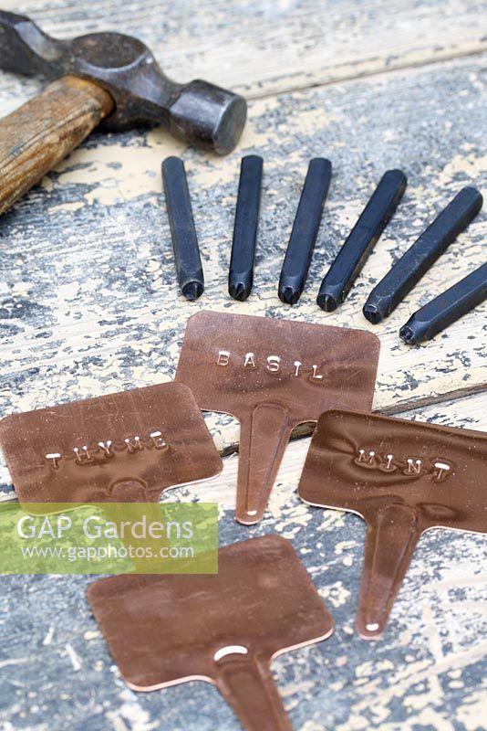 Copper T plant labels with metal stampers 