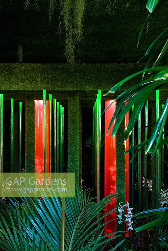 A garden inspired by a radio programme about pharmaceutical companies patenting compounds synthesised from rainforest plants - 'Possession' - RHS Hampton Court Flower Show 2012 
 