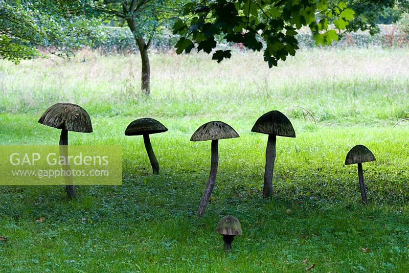 Wooden Toadstool Sculptures in the Stumpery, August 2007.  