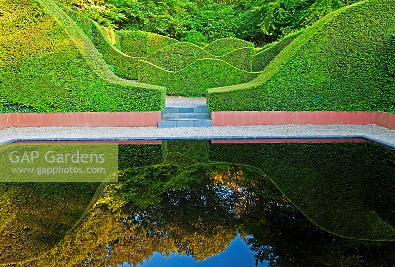 The Reflecting Pool and Hedge Garden with view to the Coppice and Yew hedges, Taxus baccata - Veddw House Garden, Monmouthshire, Wales
