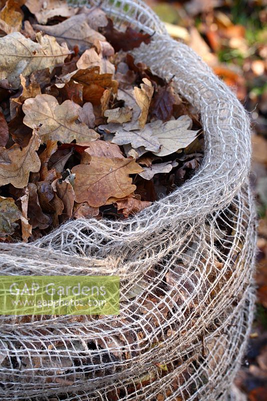 A biodegradable jute leaf sack full of autumn leaves