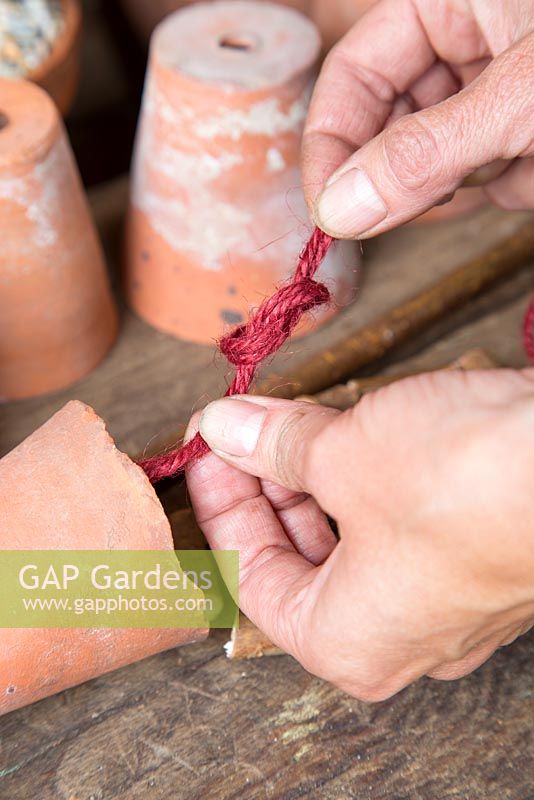 Step by step -  Making a decoration from small terracotta pots to hang inside hazel wigwam