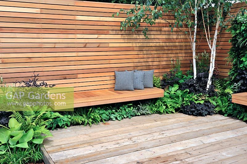 Garden wall with Ceder wood batons and built-in ceder wood bench - Escape To The City - RHS Tatton Park Flower Show 2013
