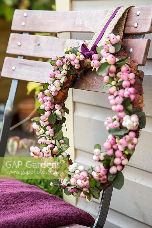 Decorative pink Snowberry wreath