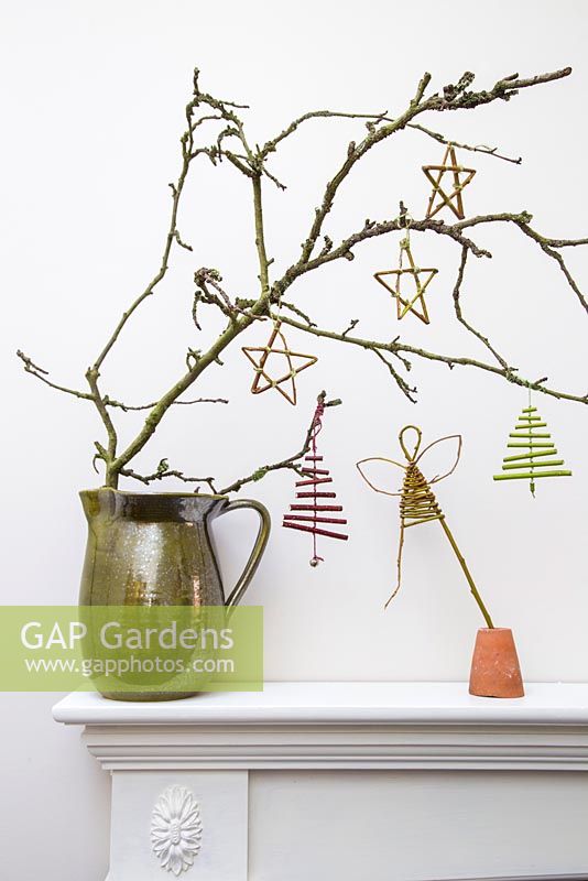 Dogwood Christmas trees, Willow Angel and Willow stars hanging from a branch