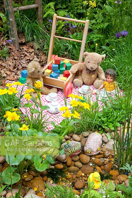 Play area with toys in The NSPCC Garden of Magical Childhood