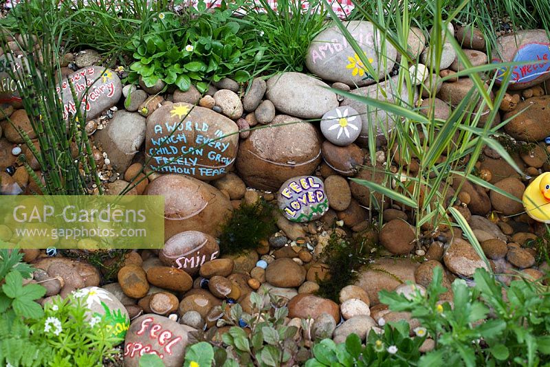 Water feature and decorative pebbles in the NSPCC Garden of Magical Childhood