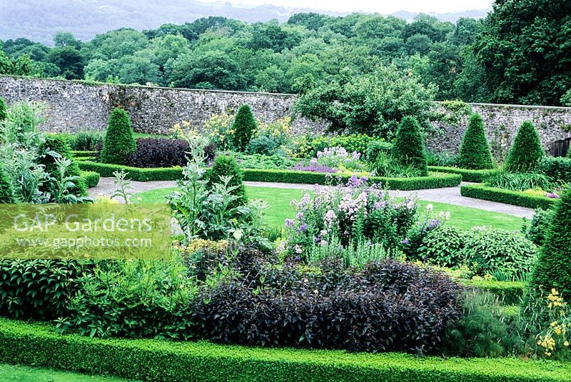 View onto the Upper walled Garden from the Parapet Walk. Planting design by Penelope Hobhouse. Aberglasney Gardens, Carmarthenshire, South Wales. July