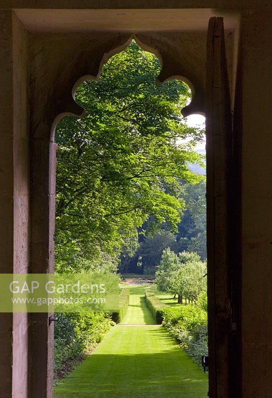 View out of the front door of the red house. Painswick Rococo Garden, Gloucestershire 